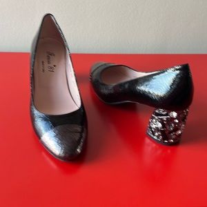Black shoes with silver toe and heels